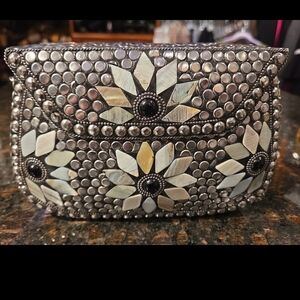 Unique Metal Handbag With Floral Design.